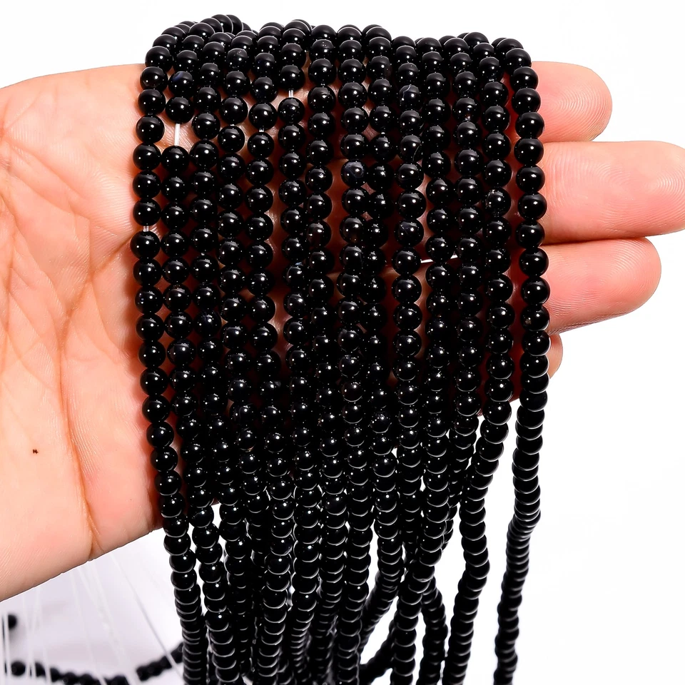 Piedras preciosas de ónix negro natural forma redonda cuentas lisas 4x4,5 mm hilo 15" UGB597 Foto 3 de 3