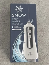 Brand New/Sealed - SNOW  The Water Flosser