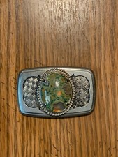 Vintage silver and black colored green hued real stone cabochon belt buckle