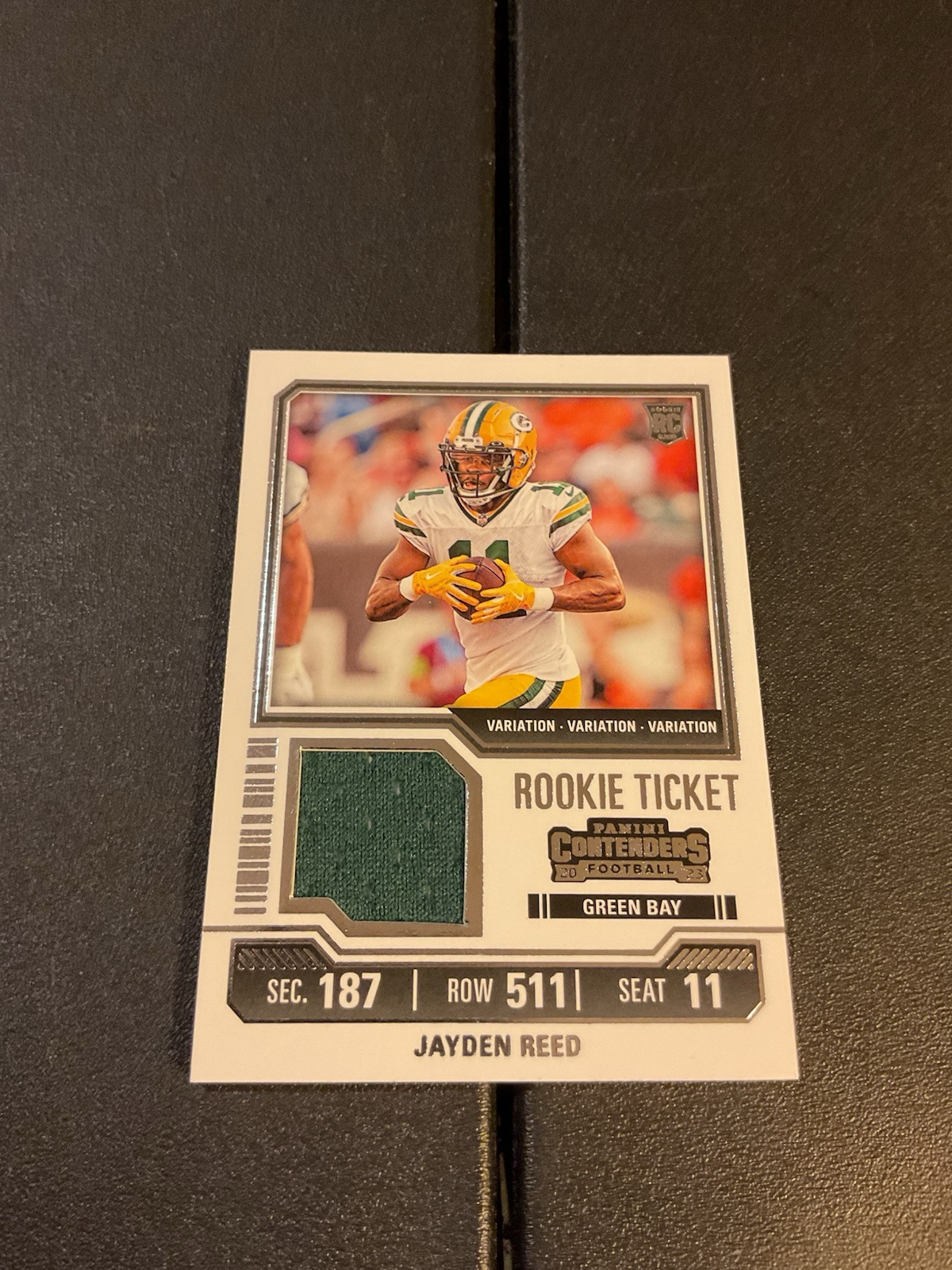 JAYDEN REED 2023 PANINI CONTENDERS ROOKIE TICKET GAME JERSEY PIECE-PACKERS-TS18V