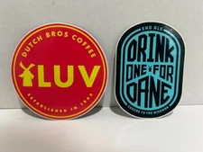 Dutch Bros Coffee Lot of 2 Stickers "LUV" and "Drink One For Dane" Unused