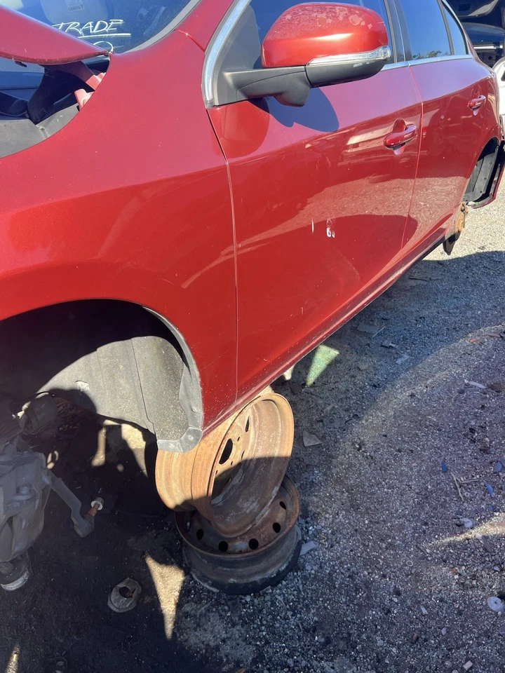 Volvo S60 2011 2012 2013 guardabarros conductor izquierdo naranja Foto 3 de 4