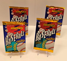 4 sealed foil packs 1994 Score Rookie & Traded. Gold parralel in every pack.