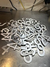 House Numbers Silver Color, Plastic , Auto adhesive. Lot