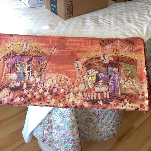 Wooden framed handcrafted curtain of Yamabuki Kaikan of dashi or festival wagons