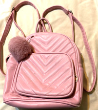 Cute girl's mini backpack pink vinyl with adjustable straps and pockets