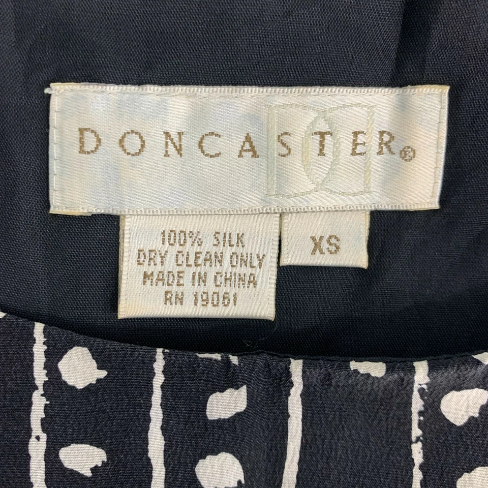 Blusa sin mangas forrada de seda DONCASTER XS negra a lunares Foto 4 de 4