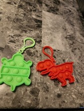 Pop It Keychains simple fidget toys red dinosaur and green turtle