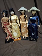 4 vintage handmade Vietnamese Dolls
