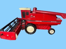 The Ertl  Vintage Red Axial-Flow Combine Toy Model Metal & Plastic Farm Equipmen