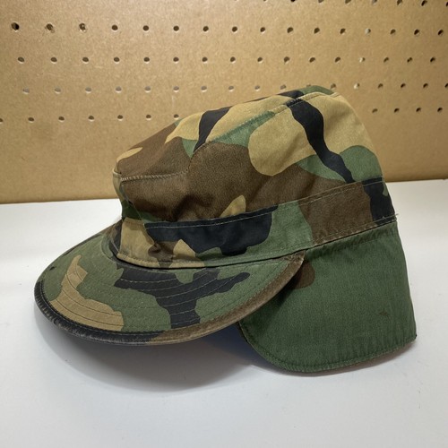 Used Cap combat Woodland Camo with Earflaps size 7 US Army