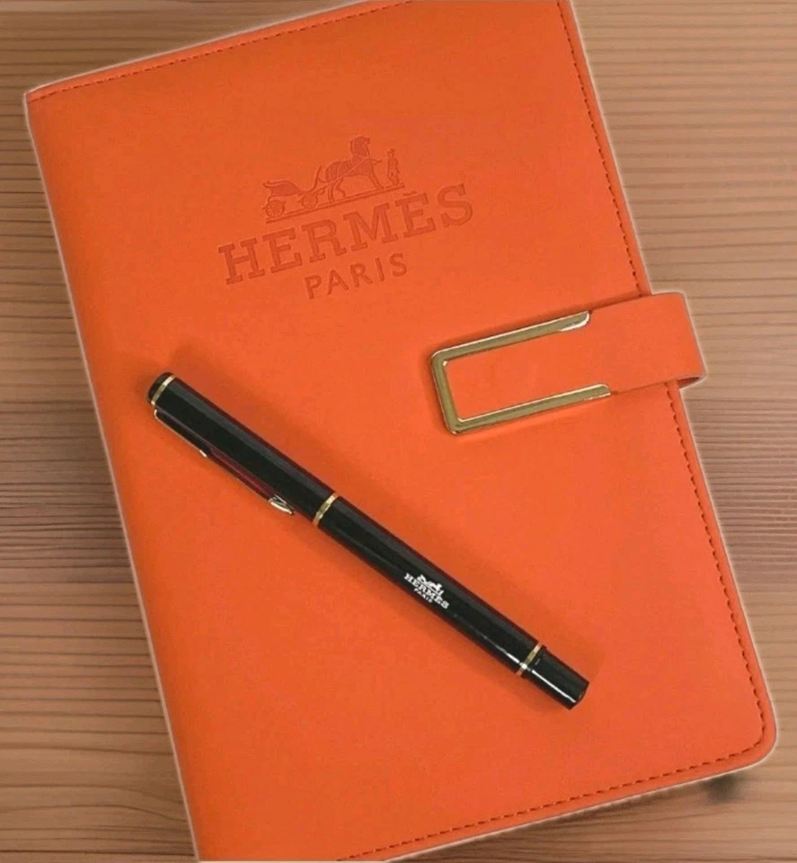 Cuaderno Hermes VIP naranja con bolígrafo GWP Foto 4 de 4