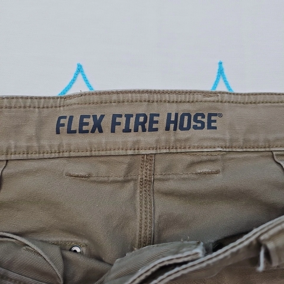 Pantalones cargo flexibles para hombre Duluth Trading Company talla 34x30 Foto 3 de 4