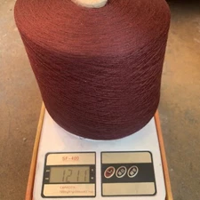 blend with 52% silk 20% cotton 6% cashmere 22% nylon yarn cone