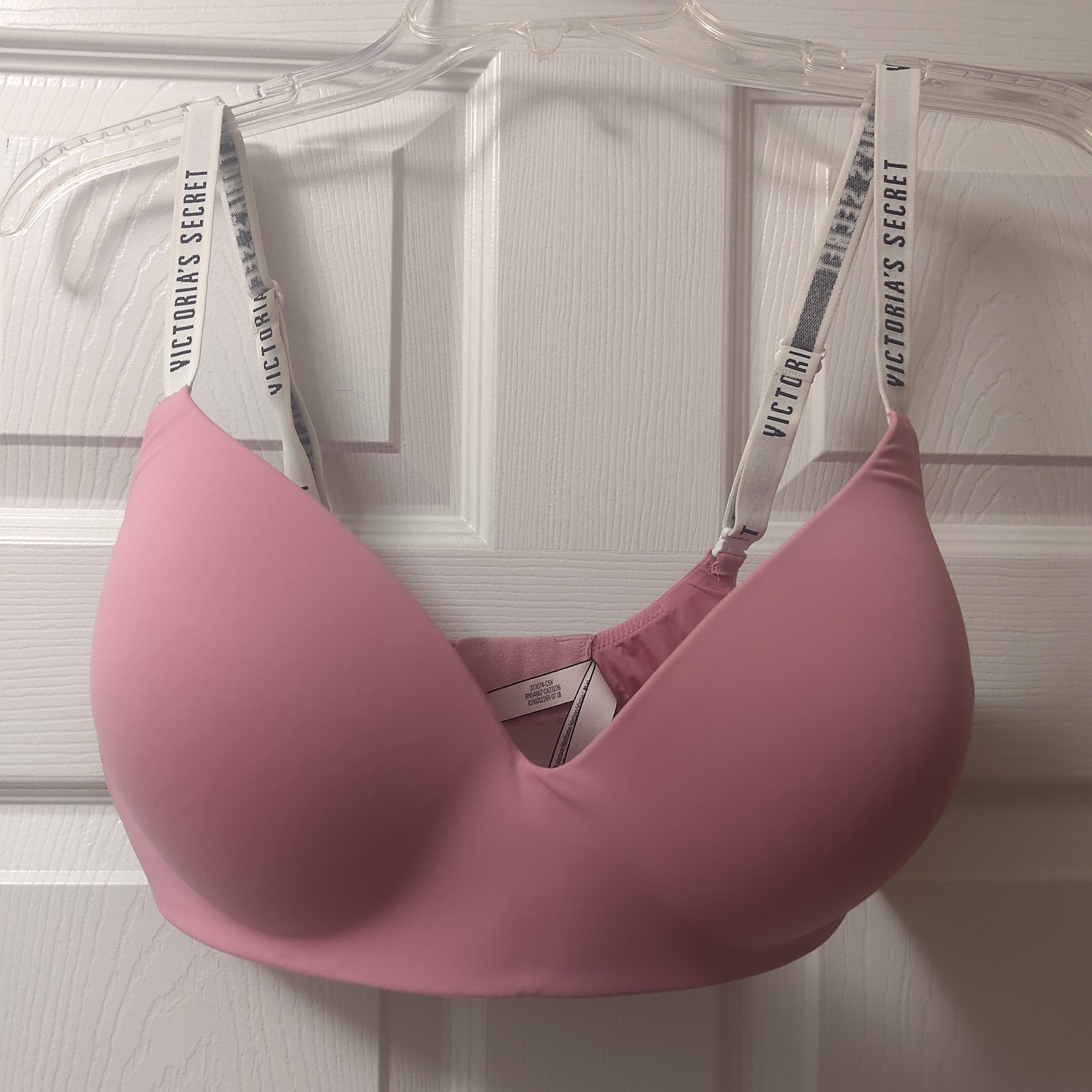 Victoria's Secret T-Shirt Lightly Lined Wireless Bra 36DD Spell Out Straps Pink