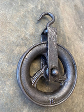 Ancienne  poulie en fer et fonte 30 cm