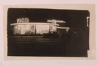 FOUND PHOTO Night Scene Ford Dealership Showroom Neon Sign 1940s  Snap Shot Vtg