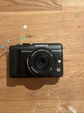 OLYMPUS DIGITAL CAMERA. M.Zuiko lens 17mm included