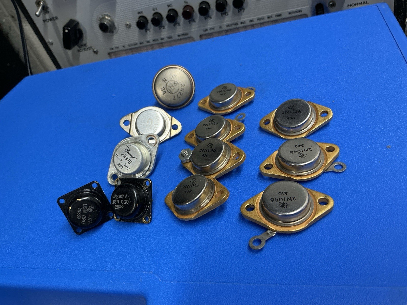 Lot of 12 transistor (7) TI 2N1046 & (2) TI 2N389 & Bendix 2N375 &2N277 &2N1146B. Available Now for $32.00