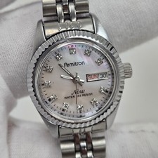 Womens Armitron Now Watch Day/Date MOP Dial Diamond Silver Ton3 New Battery