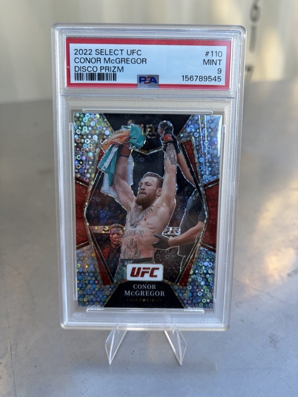Panini 2022 Select UFC Premier Level Conor McGregor #110 Disco Prizm PSA 9