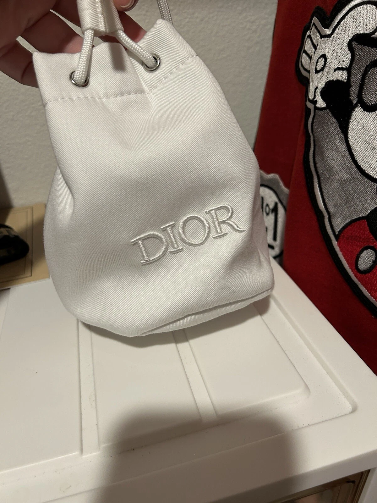 Sac à main Dior blanc pull string pochette mini pochette Dior 