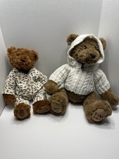 Pair Of FAO Schwartz 2010 Brown Teddy Bears One In Cardigan And One In Pajamas.