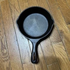 Vintage #4 three notch lodge cast iron skillet.