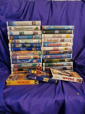 Mixed Lot of 28 Disney kids movies casper nightmare classics E.T. VHS