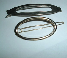2 VINTAGE CLASSIC SILVER AND GOLDTONE HAIR BARRETTES