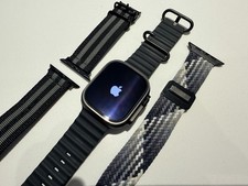 Apple Watch Ultra 2 49 mm boîtier en titane noir, bracelet océan noir + 2 bracelets supplémentaires
