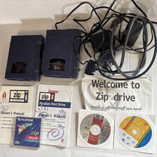 2 Iomega 100 External SCSI Blue Zip Drive With Adapter, Cables, Power,disc,book