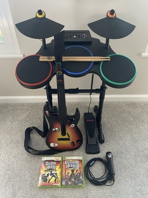 Guitar Hero Xbox 360 Bundle w/ Drums Guitar Mic and 2 Games Cleaned and Tested