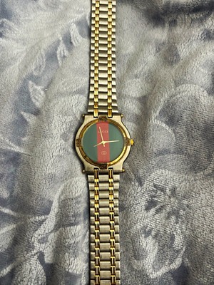 Gucci quartz watch. Two-Tone Gold and Silver Watch with Green-Red Dial