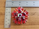 Vintage Unsigned Costume Jewelry - Gold and Red Rhinestone Flower Brooch