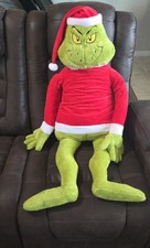 Grinch Jumbo Plush, 48 Inches Tall, Dressed in a Santa Shirt and Hat