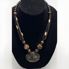 Tribal buffalo horn necklace with Round fish carved pendant — photo 1
