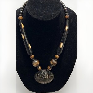 Tribal buffalo horn necklace with Round fish carved pendant
