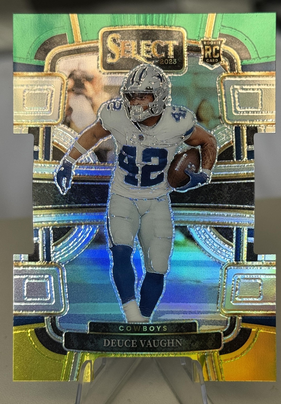 2023 Panini Select #28 Deuce Vaughn Green/Yellow Prizms Die Cuts Rookie Cowboys