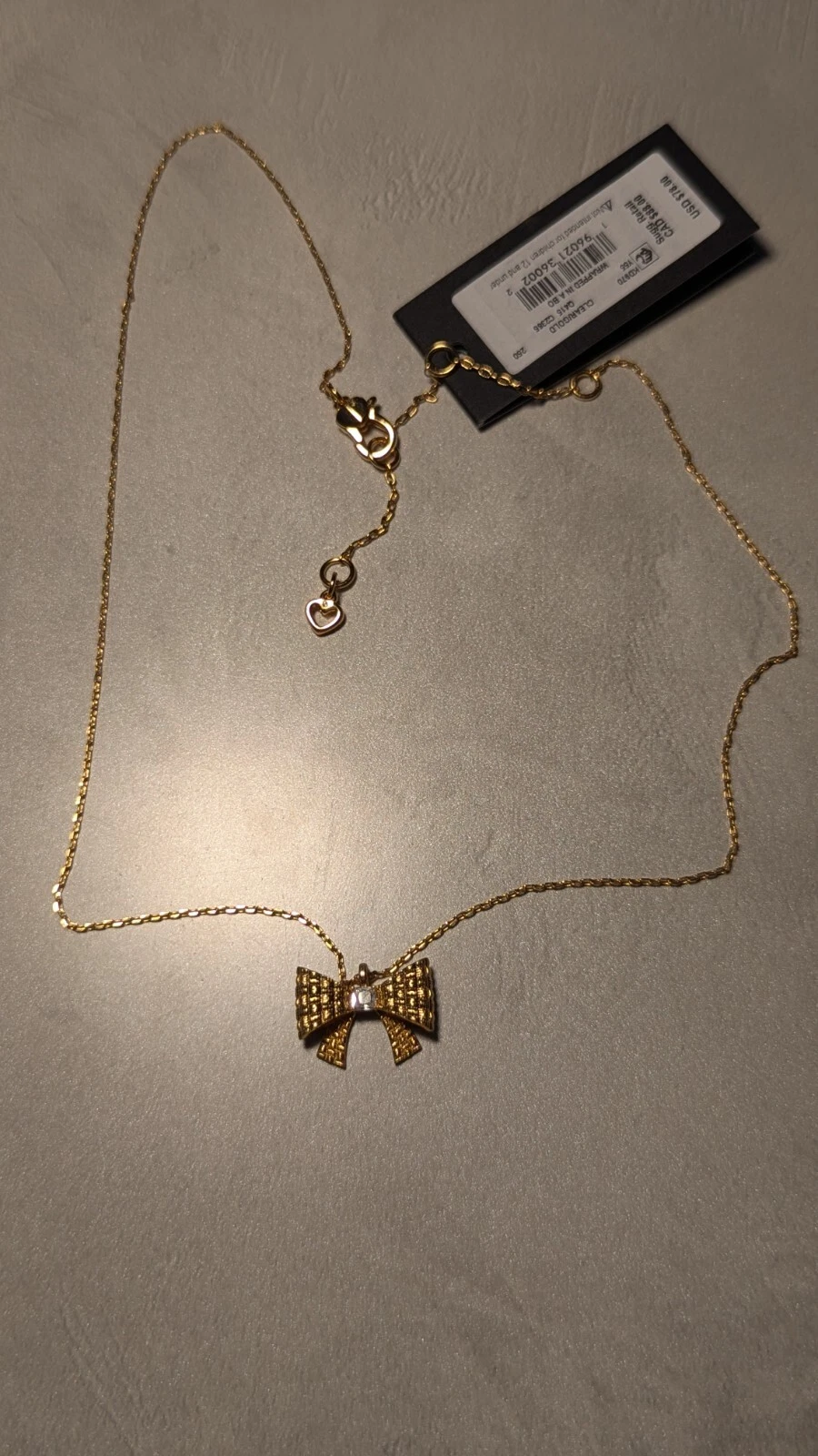 Collana Kate Spade New York fiocco placcato oro