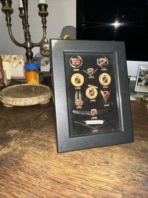VTG Licensed GM Framed Collection Of 10 Cadillac Enamel Emblem Lapel Pins 100yrs