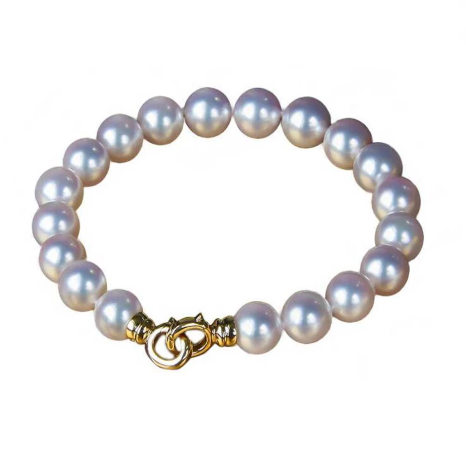 Pulsera de cuentas de perlas con cáscara blanca nudo 9-10 mm 7,5 en oro amarillo de 14k Foto 2 de 4