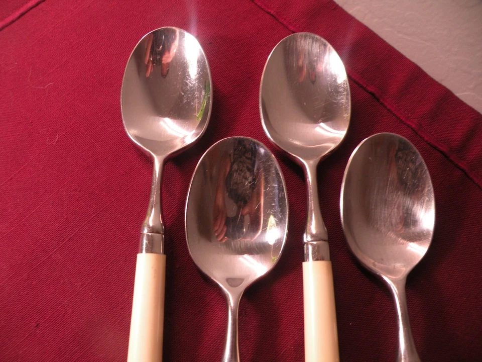 Juego de 4 cucharas soperas ovaladas Stanley Roberts SPECTRUM marfil acero inoxidable 7 5/8" Foto 2 de 4