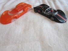 COX BLACK CUCARACHA SLOT CAR AND EXTRA BODY TESTED AND RUNS