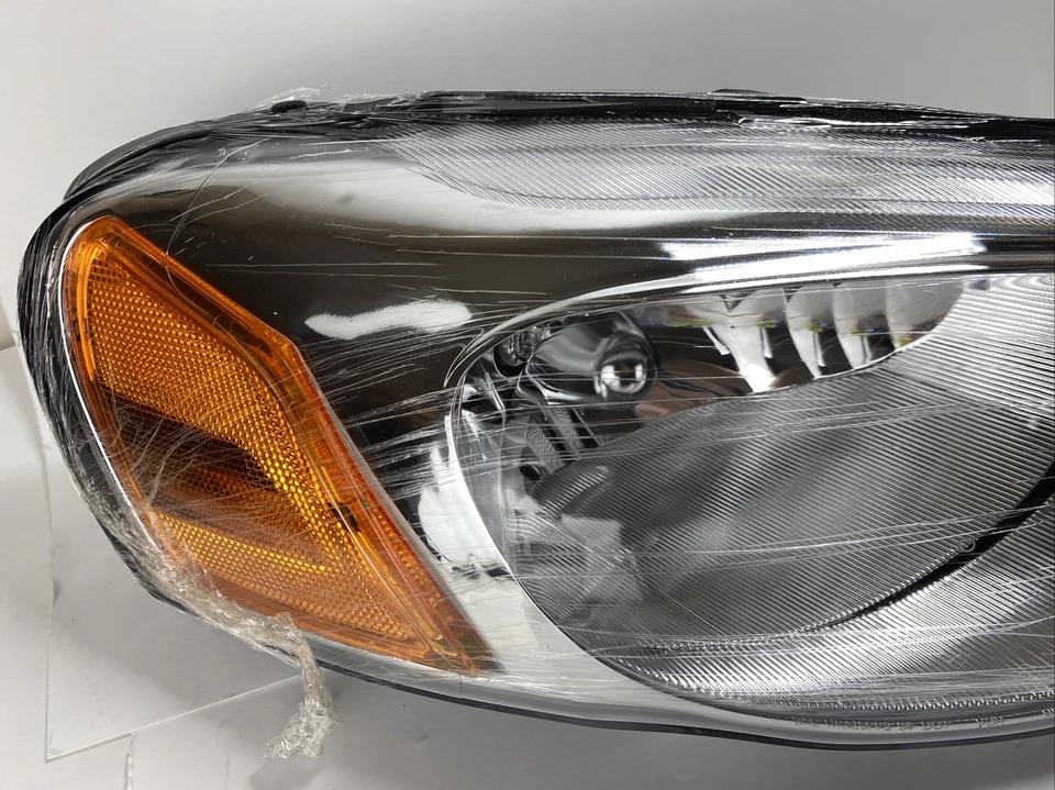 Conjunto de faros Dorman 1591103 para pasajero derecho Chrysler Sebring 04-06 Foto 3 de 4