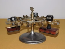 VINTAGE 6" HIGH 10" ACROSS ACHILLES METAL DESK TOP CAROUSEL 12 STAMP HOLDER