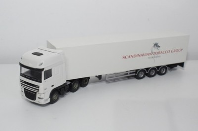 C5 1:50 LION TOYS DAF XF SCANDINAVIAN TABAK GROUP TRUCK + TRAILER EXC. ZUSTAND.