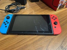 Nintendo Switch 32GB Gray Console with Neon Red and Neon Blue Joy