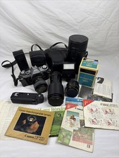 Canon AE-1 35mm SLR Film Camera with Canon Accessories, Cases, Lenses, Manuals