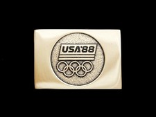 LL07149 NOS VINTAGE  1988 OLYMPICS  SOLID BRASS SPORTS BELT BUCKLE